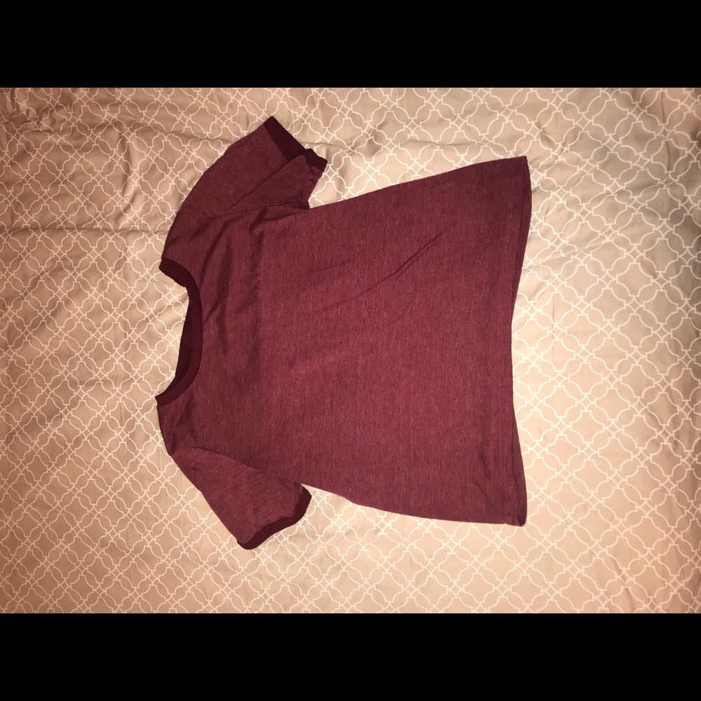 A plain maroon tee shirt
